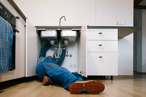 Professional Drain Cleaning technician working in Mattituck, NY
